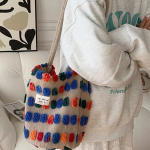 Beige plush tote bag with colorful 3D pom-poms and shoulder strap for casual wear