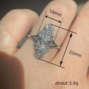 Vintage Art Deco rhombus ring with pavé crystals on finger, 10mm wide and 22mm long