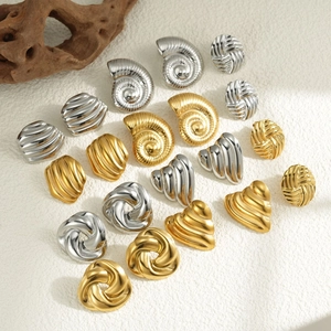 Collection of twisted conch and geometric 18k stainless steel earrings in gold and silver
