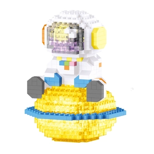 Astronaut on planet building blocks pen holder model with Saturn ring base