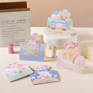 Detailed view of cartoon animal greeting cards featuring cute bear and rabbit illustrations
