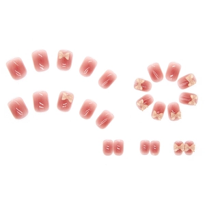 Pink jelly press-on nails with 3D crystal bows in a short square round shape
