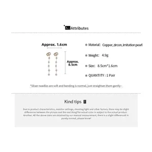 Detail showing long zircon and pearl tassel earrings with precise dimensions and weight