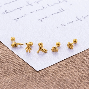 Set of five gold stainless steel animal stud earrings featuring bee bird and dolphin shapes