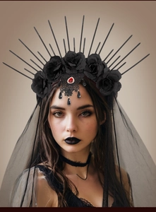 Gothic halo crown detail with black roses, red gems, and delicate lace veil elements