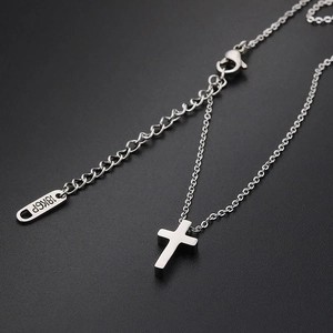 Sleek silver stainless steel cross pendant necklace with fine chain and 18KGP tag