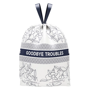 Thick drawstring trash bag with floral print and Goodbye Troubles text on white background
