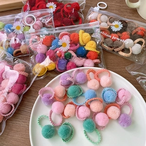 Colorful macaron plush pom pom elastic hair ties in 20-piece set with display tray