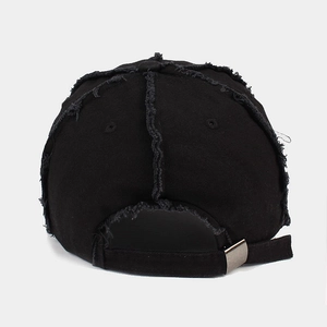 Rear view of black distressed baseball cap with raw edges and silver metal adjuster