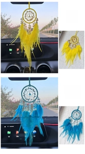 Detail of yellow and lake blue dreamcatcher car pendant with feathers and beads