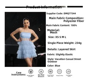 Détail de la robe bustier bleu clair en tulle avec jupe à plusieurs couches superposées