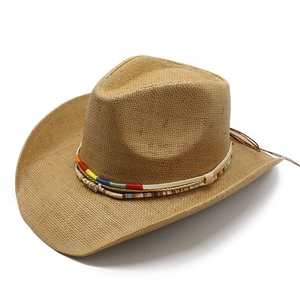 Western style woven straw cowboy hat with a colorful braided band on a white background