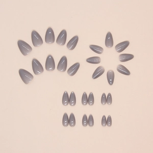 Short almond press-on nails with grey to light purple gradient and glossy jelly finish