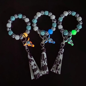 Luminous silicone bead bracelet keychain with bull head charm and decorative tassel