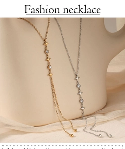 Detail of Y-shaped star necklace with sparkling zircons displayed on neck models