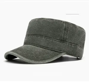 Close-up of grass green washed cotton fabric texture and stitching on flat top military cap