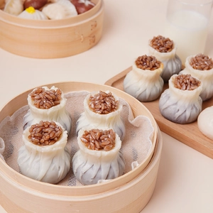Realistic steamed shumai food model in a bamboo steamer for kitchen display and props
