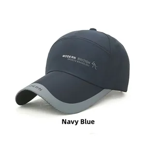 Detail view of navy blue baseball cap stitching and printed modern sports logo lettering
