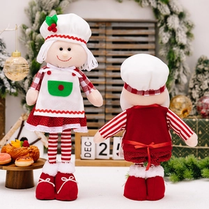 Weihnachtskoch-Plüschpuppen mit Schneemann-Design für festliche Schaufensterdekoration