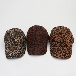 Three colors of vintage leopard print baseball caps with a structured six-panel design