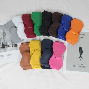 Collection of colorful elastic waist belts with stylish faux leather bow buckles for women