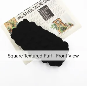 Black puff quilted pencil case with textured 3D fabric on minimalist background