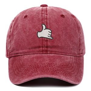 Detailed embroidery of Shaka hand gesture on vintage washed burgundy cotton baseball cap