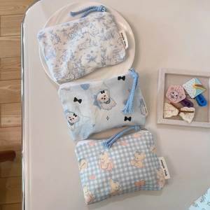 Three-piece set of mini cotton pouches with floral, puppy, and bear patterns