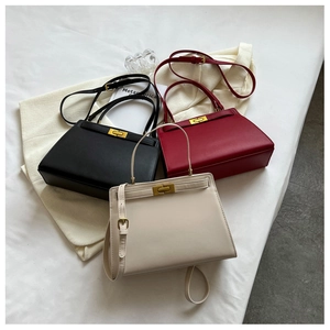 Chic women's Kelly-style bags in black, red, and beige colors with metal twist locks