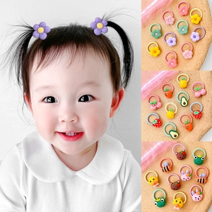 Colorful cartoon kids hair ties set featuring flower and fruit shapes for girls
