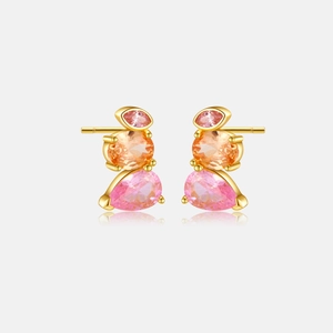 Detailed macro view of S925 sterling silver earrings with pink and orange zircon stones