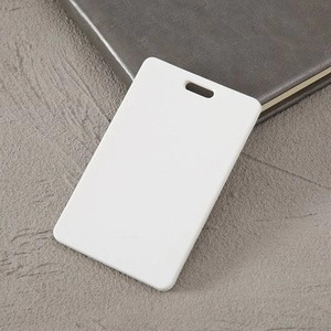 Detailed close-up of a white blank ABS plastic ID card holder with oval punch hole