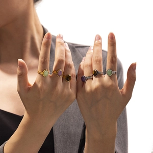Retro stainless steel rings with natural stones like amethyst and tiger eye on models