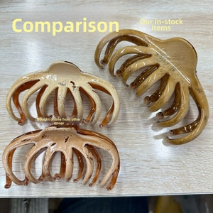 Comparison showing large amber octopus hair claw clip versus medium cream hair accessories