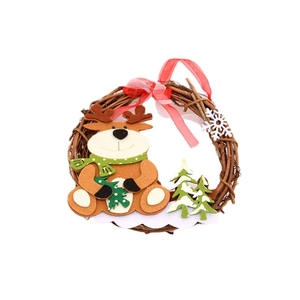 Christmas wreath with reindeer and felt pines on natural rattan wood for door decor