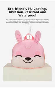 Waterproof test on pink rabbit schoolbag showing high-quality durable PU coating