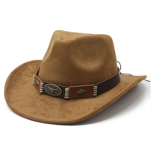 Detail of faux suede cowboy hat with vintage bull head badge and leather band
