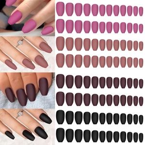 Short matte coffin fake nails in pink, mauve, burgundy, and black finishes on display