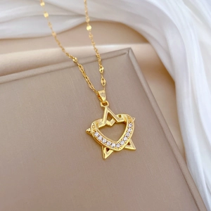 Luxurious gold star and heart pendant necklace with shimmering crystals on fine O-chain