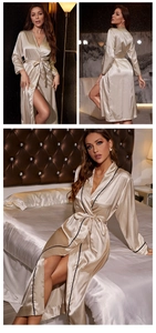 Detail view of champagne silk satin robe featuring black piping and adjustable waist tie belt