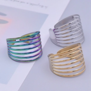 Three-piece set of multilayer geometric open rings in rainbow, silver, and gold steel finish