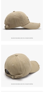 Detailed view of khaki distressed baseball cap with side embroidery and metal buckle