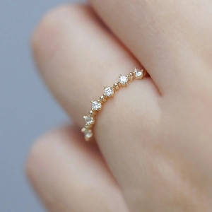 Elegant 18K gold plated silver thin ring with sparkling row of seven micro-set zircons