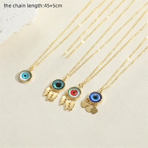 Bohemian gold evil eye pendant necklace set with colorful zircon stones for women