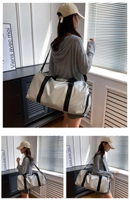 Detail of silver reflective travel bag with durable black straps and waterproof surface