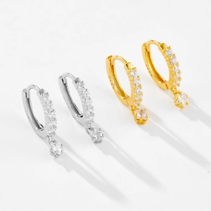 Detail view of S925 sterling silver star hoop earrings with sparkling zircon stones
