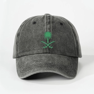 Washed dark grey denim baseball cap with green Saudi emblem palm tree and swords