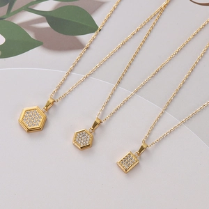 Detailed comparison of three gold geometric zircon pendants on thin stainless steel chains
