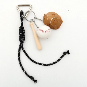 Detailed view of baseball keychain with mini bat, ball, glove, and braided nylon rope