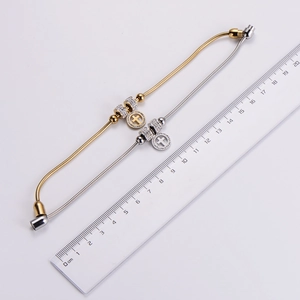 Minimalist snake chain bracelet with crystal charms in gold and silver finishes